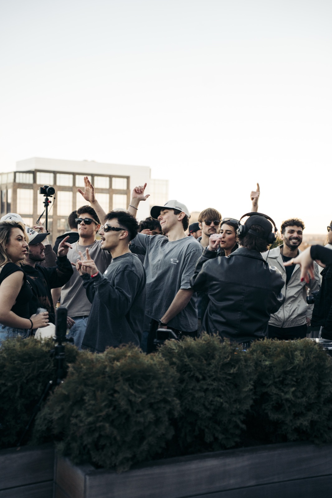 Circuit 909 rooftop crowd at sunset